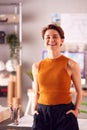 Portrait Of Smiling Female Architect In Office Standing By Desk Royalty Free Stock Photo