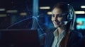 Portrait of smiling female customer support phone operator in headset looking at camera while standing in night office with double