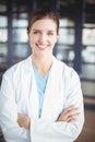 Portrait of smiling female doctor with arms crossed Royalty Free Stock Photo