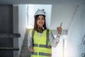 Portrait smiling female engineer with laptop at construction site Royalty Free Stock Photo
