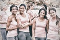 Female volunteers participating in breast cancer awareness Royalty Free Stock Photo