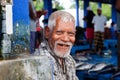 Portrait of smiling fisherman on fish market