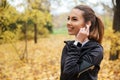 Portrait of a smiling fitness girl listening to music Royalty Free Stock Photo
