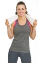 Portrait of smiling fitness young woman with towel Royalty Free Stock Photo