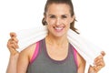 Portrait of smiling fitness young woman with towel Royalty Free Stock Photo