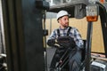 Portrait of a smiling forklift driver Royalty Free Stock Photo