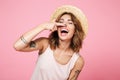 Portrait of a smiling funny girl in summer hat Royalty Free Stock Photo