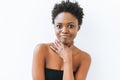 Portrait of smiling funny young African American woman in black top isolated on white background Royalty Free Stock Photo