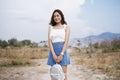 Portrait of smiling girl holding backpack