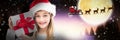 Composite image of portrait of smiling girl holding christmas gift against white background Royalty Free Stock Photo