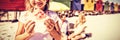 Portrait of smiling girl holding watermelon with parents in background Royalty Free Stock Photo