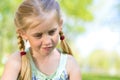 Portrait of a smiling girl in a park