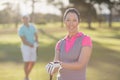 Portrait of smiling golfer woman Royalty Free Stock Photo