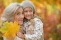 smiling grandmother and granddaughter