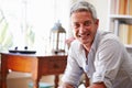 Portrait ofÃ¯Â¿Â½a smiling grey haired man