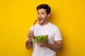 Portrait of Smiling Guy Holding Bowl With Salad Royalty Free Stock Photo