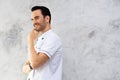 Portrait of smiling handsome chef posing against with beard looking to side Royalty Free Stock Photo