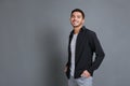 Portrait of smiling handsome and confident young businessman in black shirt Royalty Free Stock Photo