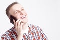 Portrait of Smiling Happy Caucasian Man Speaking on Cellphone. Royalty Free Stock Photo