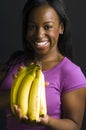 Portrait smiling happy latin woman with bananas