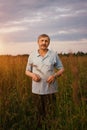 Portrait smiling happy old Elderly male having fun, walking on field in village. Healthcare lifestyle senior man relax in Royalty Free Stock Photo