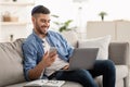 Happy jewish man using mobile phone and laptop Royalty Free Stock Photo