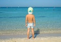 Portrait smiling little baby boy playing in the sea, ocean. Positive human emotions, feelings, joy. Funny cute child making vacati Royalty Free Stock Photo