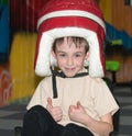 Portrait of a smiling little boy with a funny hat on his head Royalty Free Stock Photo