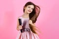 Portrait of smiling little girl brushing her hair Royalty Free Stock Photo