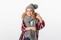 Portrait of a smiling little girl dressed in winter hat Royalty Free Stock Photo