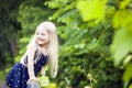 Portrait of smiling little girl walking in park Royalty Free Stock Photo