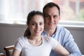 Portrait of smiling loving couple posing looking at camera Royalty Free Stock Photo