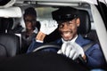 Portrait Of A Smiling Male Chauffeur Driving Car Royalty Free Stock Photo