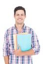 Portrait of smiling male college student holding books Royalty Free Stock Photo
