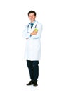 Portrait of a smiling male doctor holding green apple on white Royalty Free Stock Photo