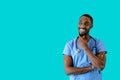 Portrait of a smiling male doctor or nurse thinking Royalty Free Stock Photo