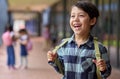 Portrait Of Smiling Male Elementary School Pupil Outdoors With Backpack At School Royalty Free Stock Photo