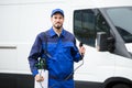 Portrait Of A Smiling Male Pest Control Worker Royalty Free Stock Photo