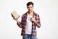 Portrait of a smiling male student holding books Royalty Free Stock Photo