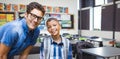 Composite image of portrait of smiling male teacher with student Royalty Free Stock Photo