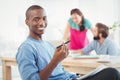 Portrait of smiling man holding pen Royalty Free Stock Photo