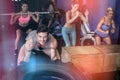 Portrait of smiling man lifting tire in gym Royalty Free Stock Photo