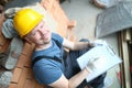 Cheerful builder in hardhat