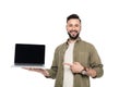 portrait of smiling man pointing at laptop with blank screen Royalty Free Stock Photo