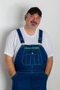 Portrait of smiling man wearing dungarees