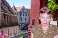 Portrait of smiling mature woman on the balcony Royalty Free Stock Photo