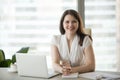 Portrait of smiling confident businesswoman posing for photoshoo Royalty Free Stock Photo