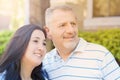 Portrait of smiling middle-aged couple looking forward Royalty Free Stock Photo