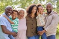 Portrait Of Smiling Multi-Generation Family At Home In Garden Together Royalty Free Stock Photo