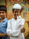 Portrait of smiling Muslim boy.Image taken at Amroha, Uttar Pradesh,India